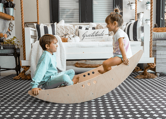 Wooden rocking boat and climber – gross motor play - The Nurturing Nook