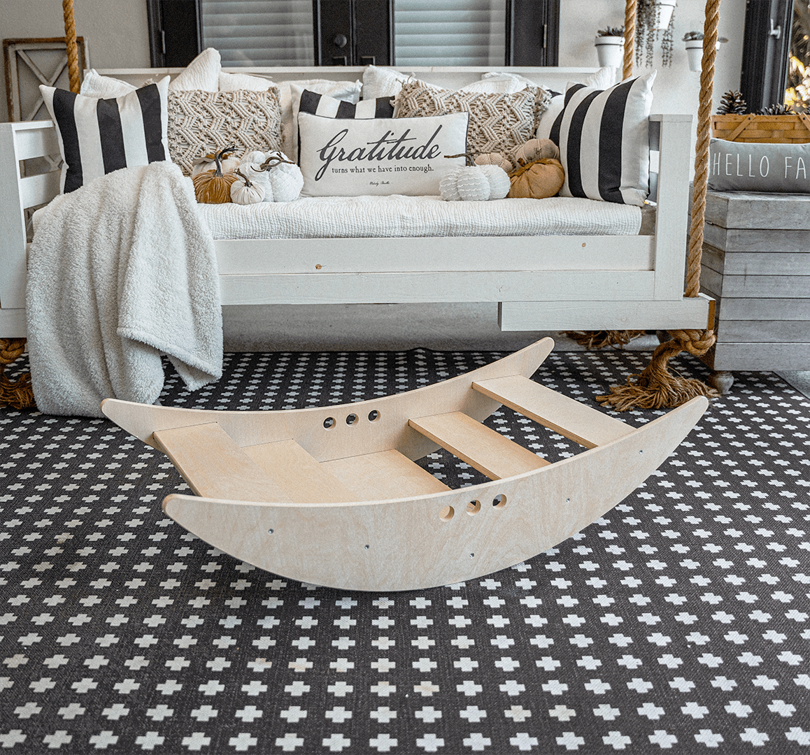 Wooden rocking boat and climber – gross motor play - The Nurturing Nook