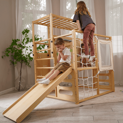 Alpine indoor climbing gym with slide and climbing wall - The Nurturing Nook