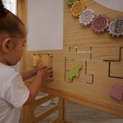 Alpine indoor climbing gym with slide and climbing wall - The Nurturing Nook