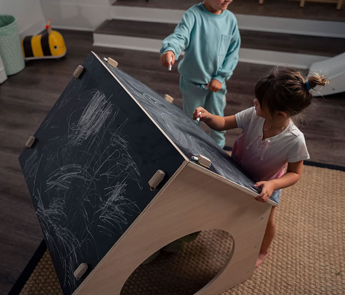 Evergreen wooden playhouse with chalkboard roof - The Nurturing Nook