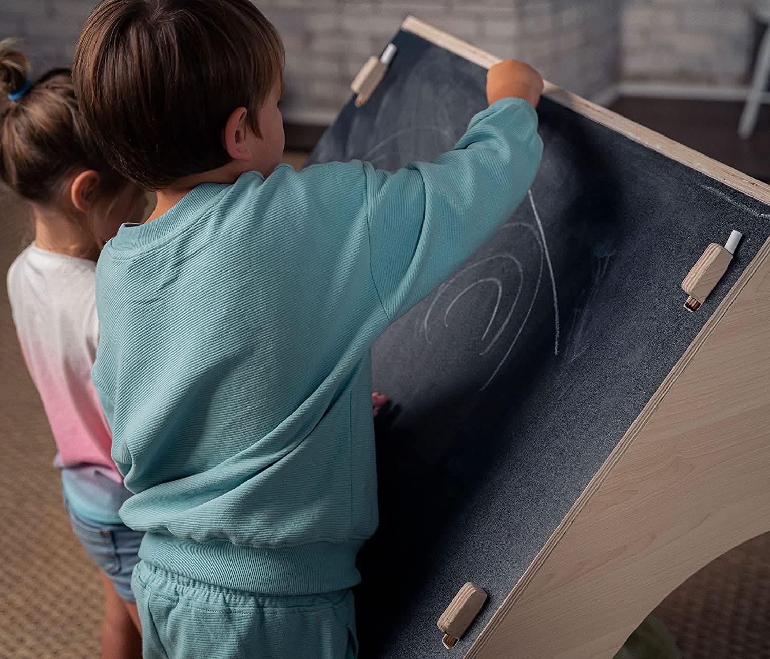 Evergreen wooden playhouse with chalkboard roof - The Nurturing Nook
