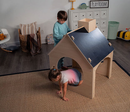Evergreen wooden playhouse with chalkboard roof - The Nurturing Nook