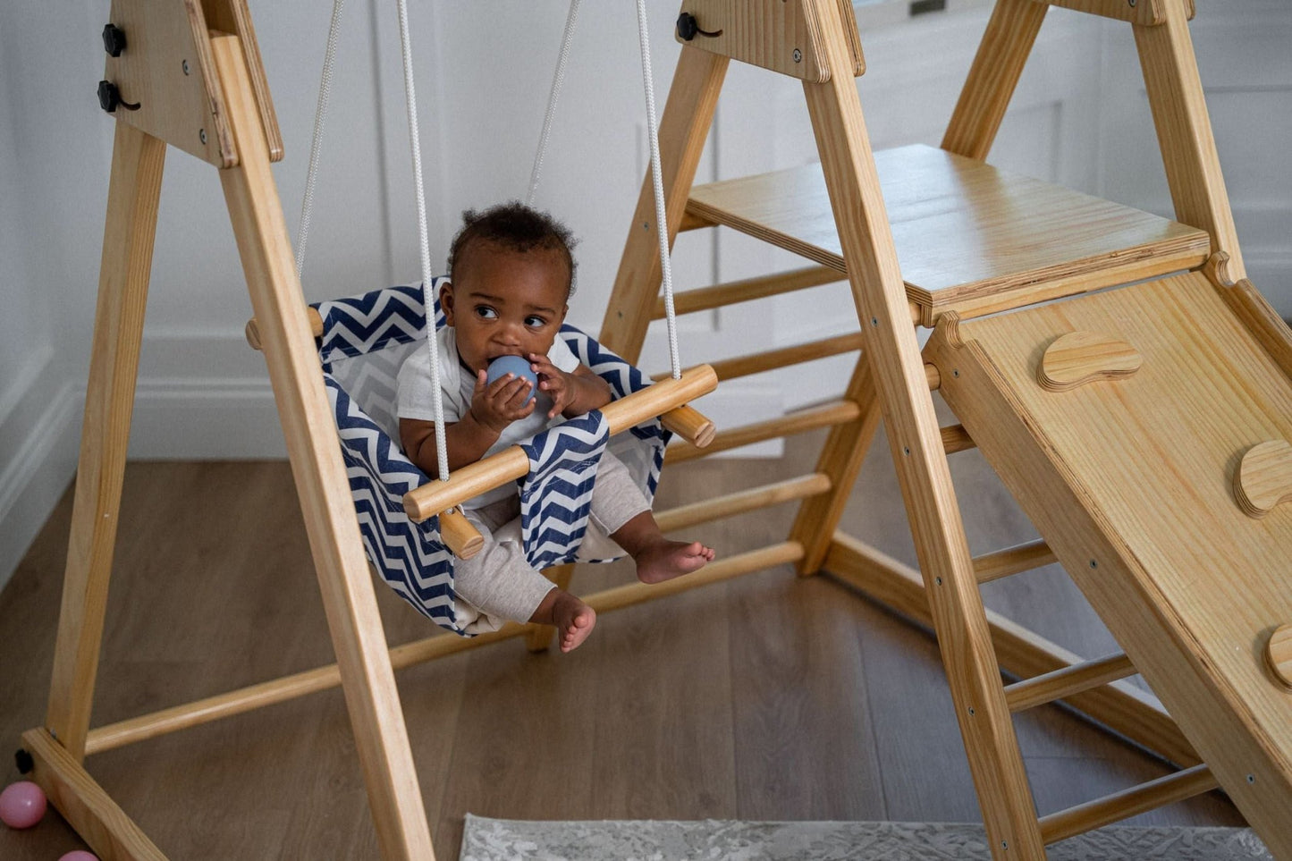 Foldable playset with slide, swings & rock wall - The Nurturing Nook