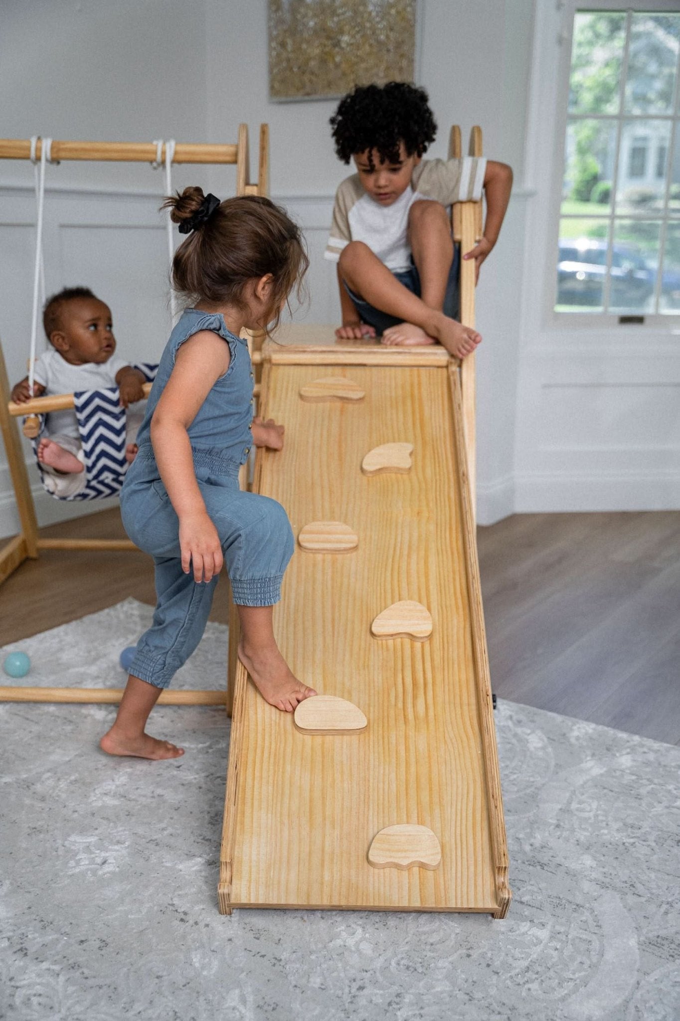 Foldable playset with slide, swings & rock wall - The Nurturing Nook