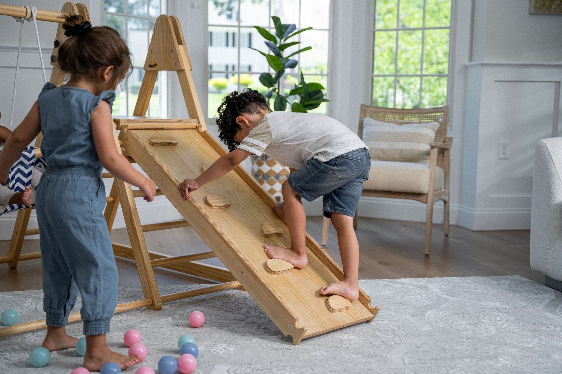 Foldable playset with slide, swings & rock wall - The Nurturing Nook