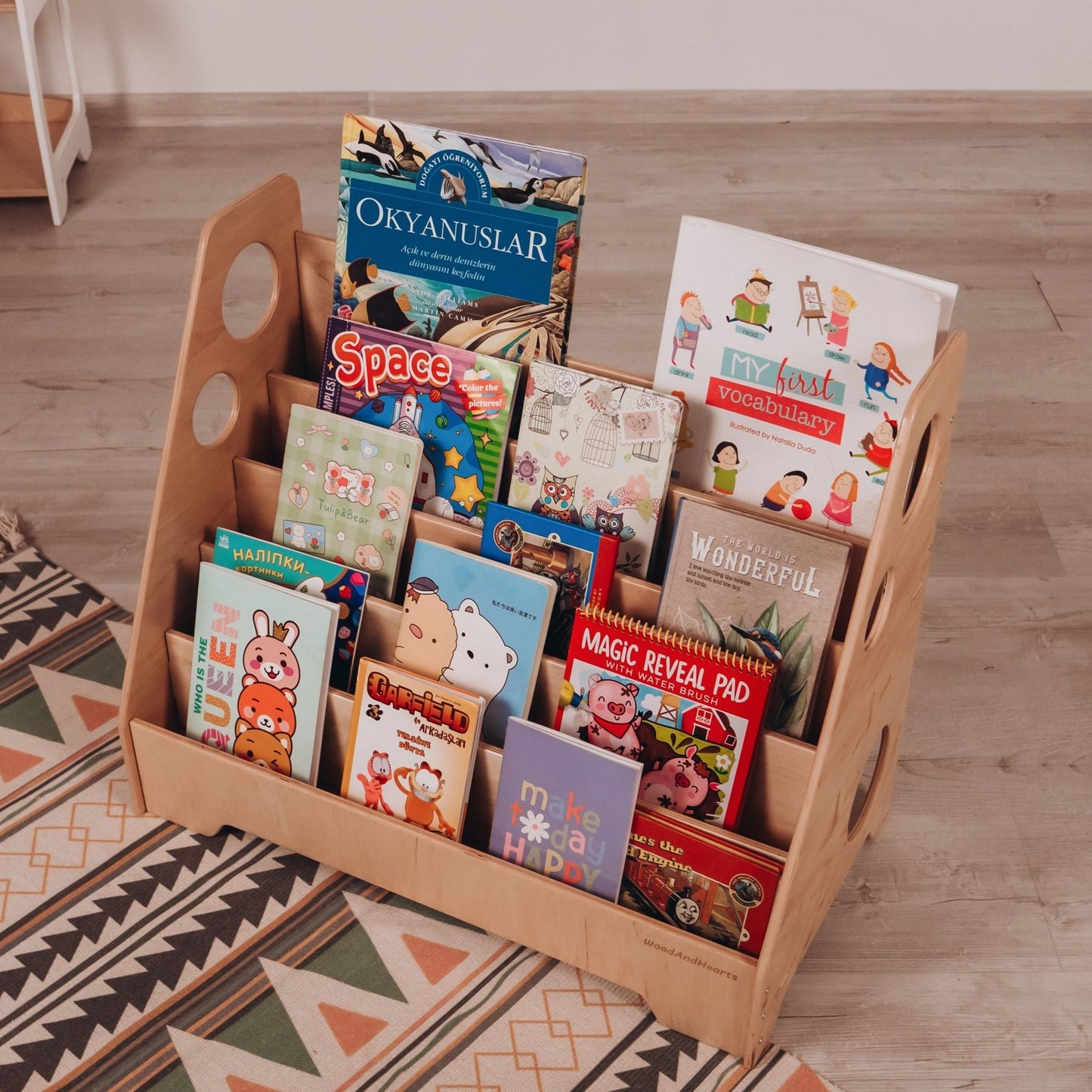 Montessori bookshelf – 5 - shelf front - facing bookcase - The Nurturing Nook