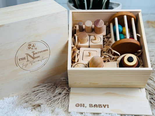 Montessori essentials gift box for 6 - 12 months – baby milestone gift with developmental toys, perfect for half - year celebrations - The Nurturing Nook