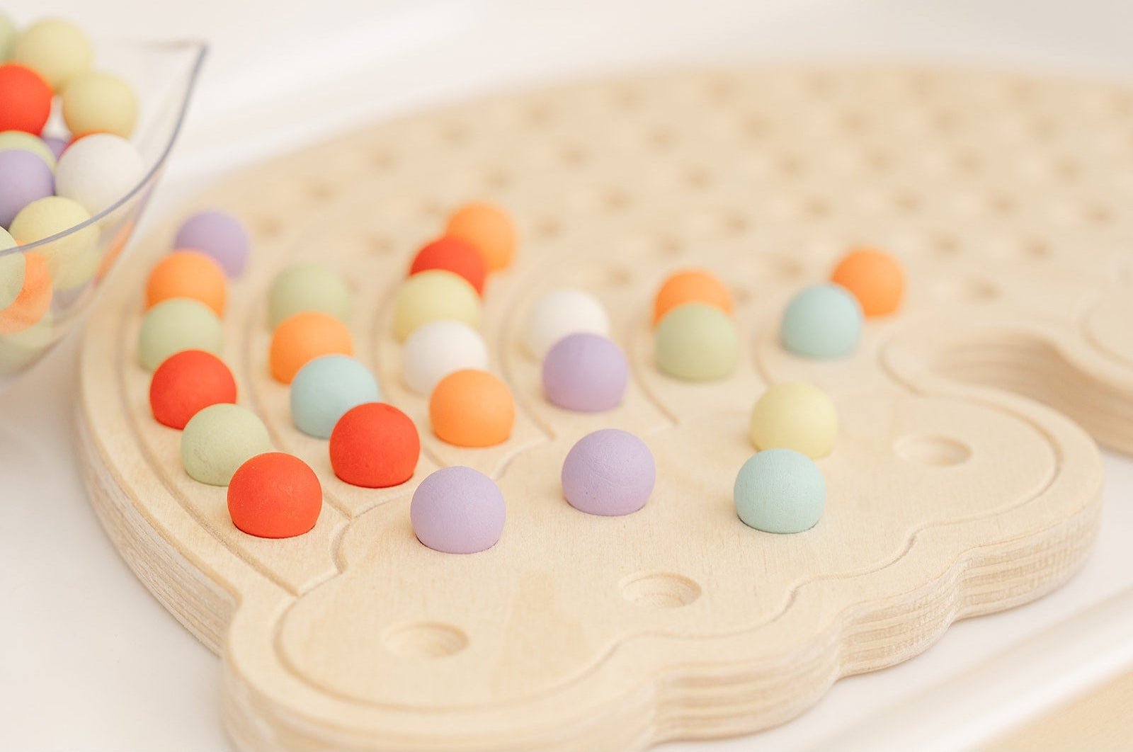The Rainbow Activity Board - The Nurturing Nook